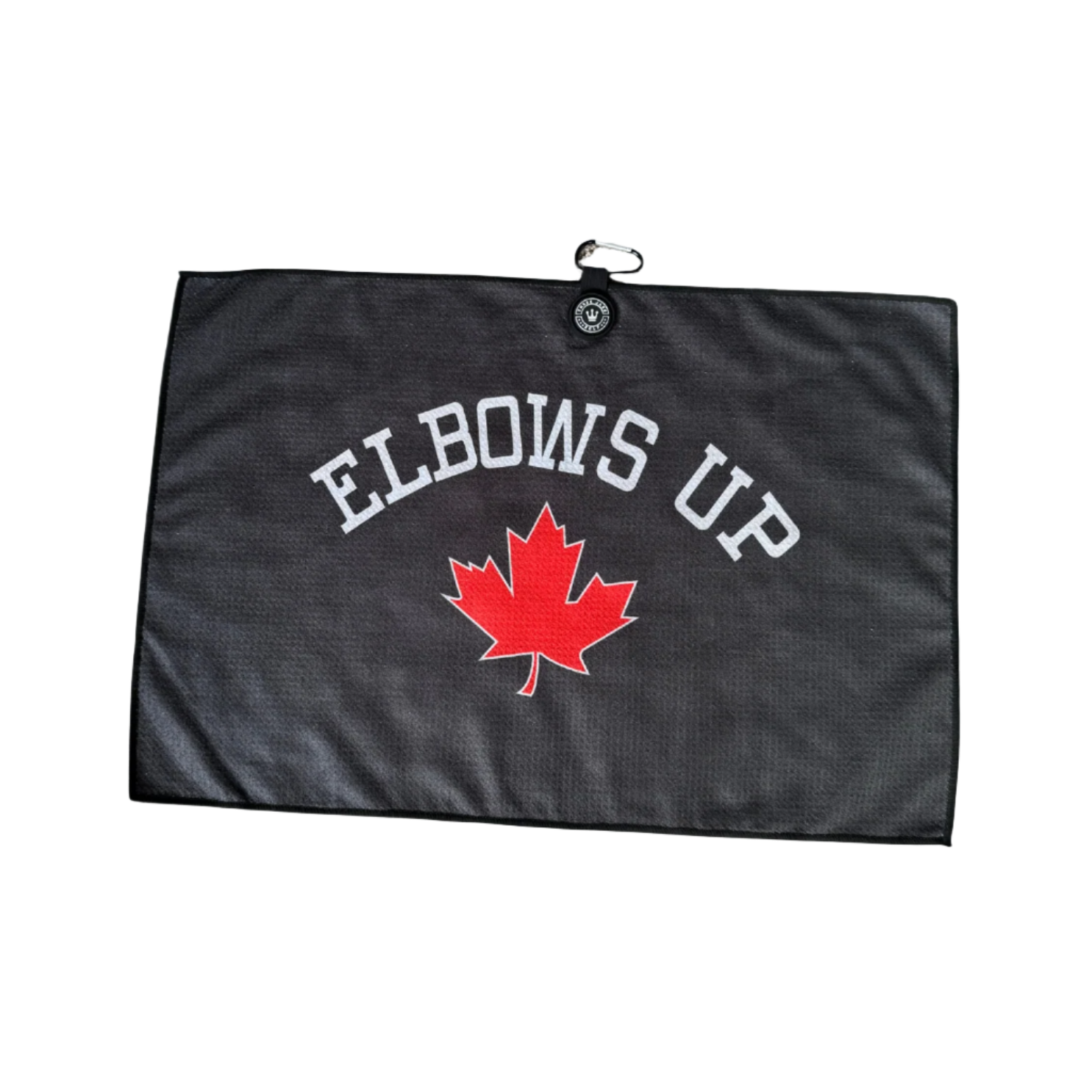 A black golf towel with a red maple leaf and the text 'ELBOWS UP' printed in white.